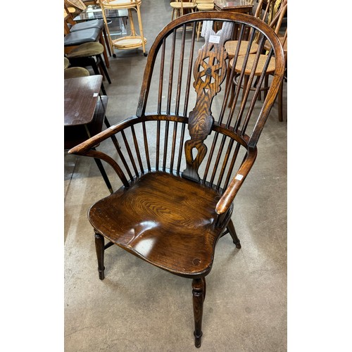 163 - A 19th Century style elm Windsor chair