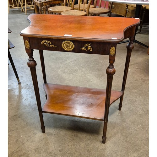 205 - A small French mahogany and parcel gilt console table