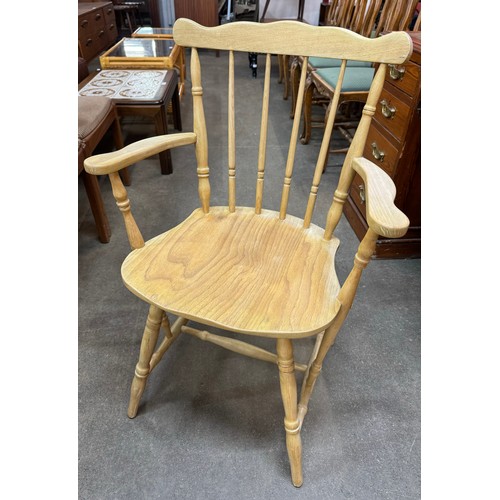 166 - A set of five spindle back kitchen chairs