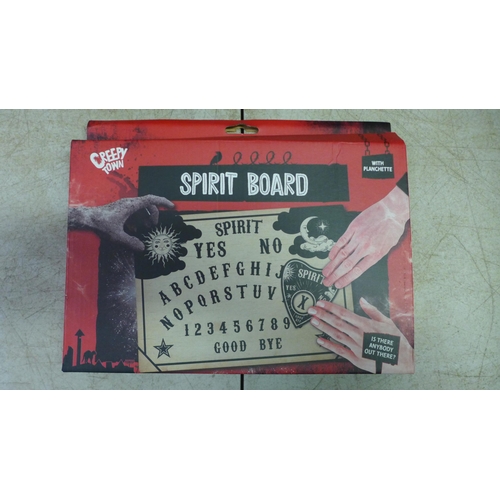 2039 - 3 boxes of 12 Creepy Town Ouija boards