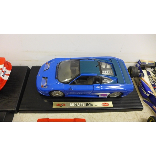 2048 - A collection of model cars - twelve in total including three F1 cars, three Maisto cars - (Jaguar XJ... 