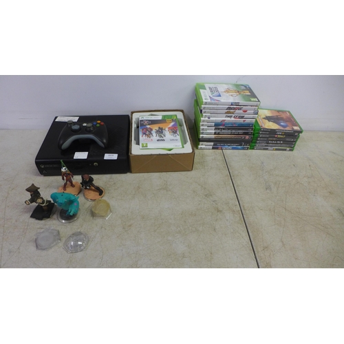 2079 - An Xbox 360 E console with controller, power supply and other cables, a Disney Infinity game board w... 