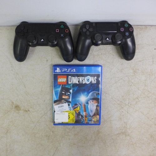 2080 - Two wireless PlayStation 4 controllers and a copy of PlayStation 4 Lego dimensions