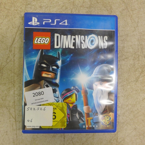 2080 - Two wireless PlayStation 4 controllers and a copy of PlayStation 4 Lego dimensions