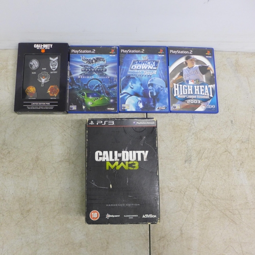 2081 - 3 PlayStation 2 games, a Call of Duty MW3 Hardened Edition pack and Black Ops 4 pin set