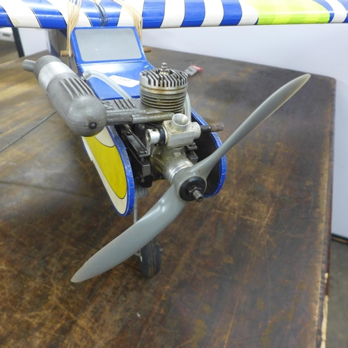 2089 - A remote-control airplane with a petrol engine, Thunder Tiger DC-12v HI-TORK starter motor, assorted... 