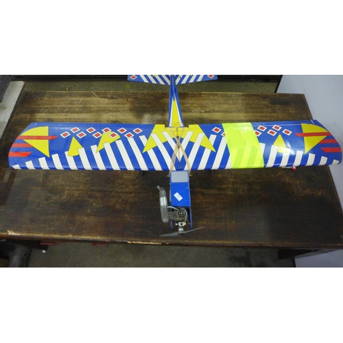 2089 - A remote-control airplane with a petrol engine, Thunder Tiger DC-12v HI-TORK starter motor, assorted... 