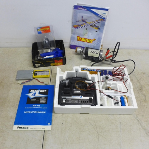 2089 - A remote-control airplane with a petrol engine, Thunder Tiger DC-12v HI-TORK starter motor, assorted... 