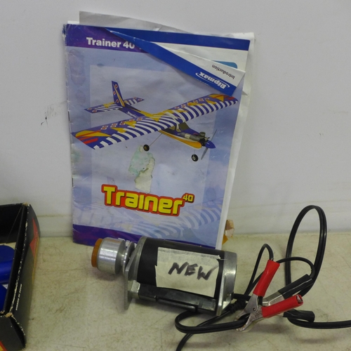 2089 - A remote-control airplane with a petrol engine, Thunder Tiger DC-12v HI-TORK starter motor, assorted... 