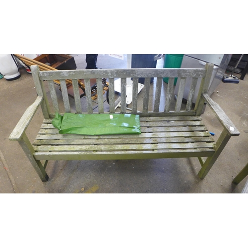 2158 - A 110cm x 72cm wooden garden table with parasol and a 150cm wooden garden bench