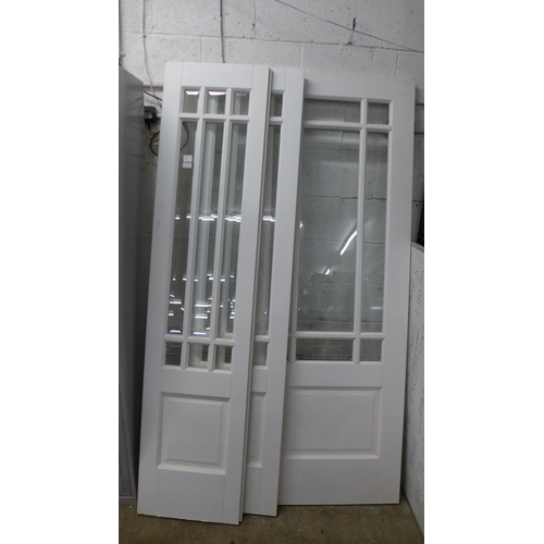 2133 - A glass panelled door 198cm or 78