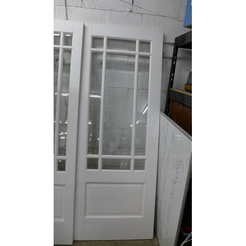 2133 - A glass panelled door 198cm or 78