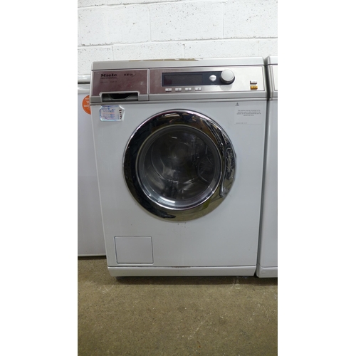 2138 - A Miele professional (PW6065) Vario washing machine with stand