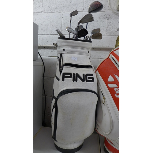 2146 - Two tour golf bags- A Ping Ti ST bag with an assortment of golf clubs including MD Golf, Ping, Calla... 