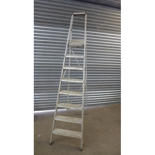 2163 - An 8 rung aluminium step ladder and a steel jerry can