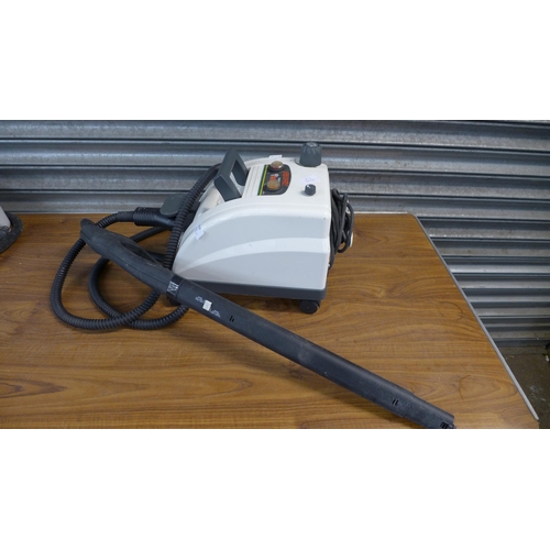 2239 - A Vaporetto Polti 1500 steam cleaner with a bag of accessories and an Earlex steam wallpaper strippe... 