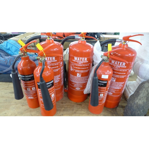 2252 - 6 assorted fire extinguishers - 3 water and 3 CO 2 with signage and brackets