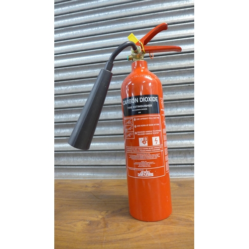 2252 - 6 assorted fire extinguishers - 3 water and 3 CO 2 with signage and brackets