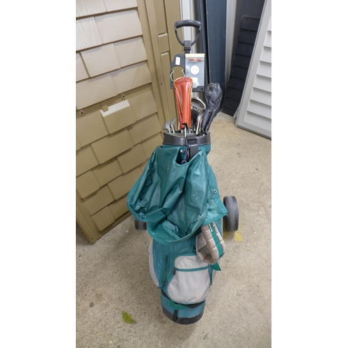 2258 - A Taylor Made golf bag with a set of Welby Deity golf clubs and a Golf King trolley