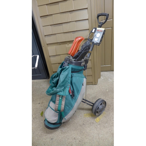 2258 - A Taylor Made golf bag with a set of Welby Deity golf clubs and a Golf King trolley