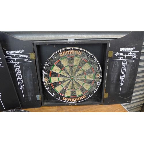 2269 - A Winmau Diamond dartboard and a Winmau Diamond Plus dartboard (both in wooden cases) and one other ... 