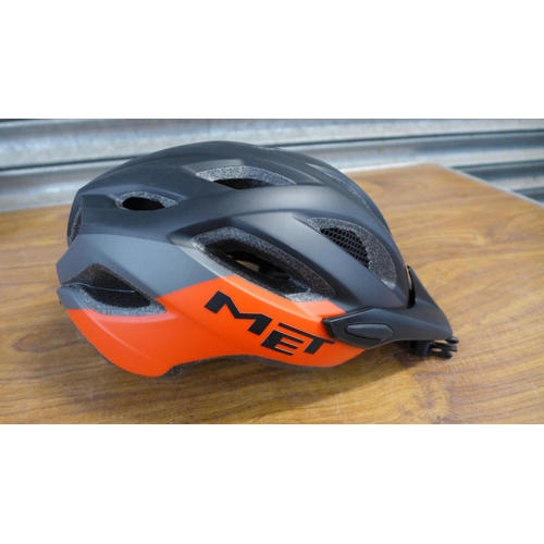 2277 - A collection of 44 Raleigh and Met cycling helmets, all sizes, as new including Uvex bike bag