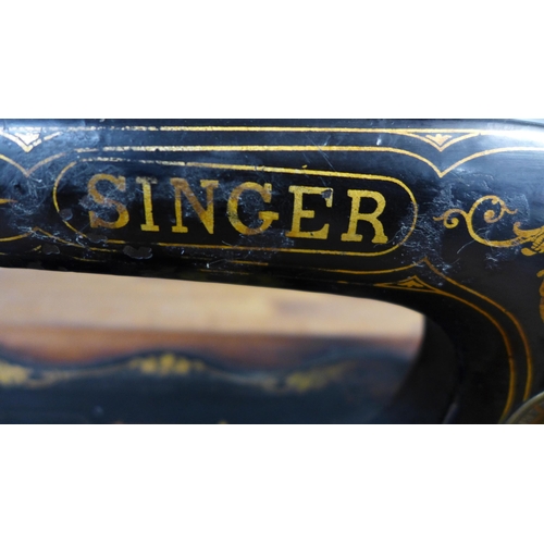 2285 - A Singer hand sewing machine, serial no. 3939856 manufacturers date 1880