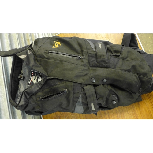 2293 - A set of gents motorcycle clothing including boots, waterproof trousers, coat, J&S trousers, motorbi... 