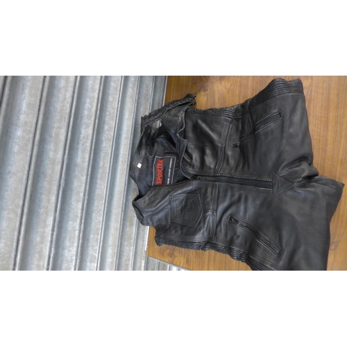 2296 - A ladies size 14 set of Sportex riding leathers, a set of size M Belstaff bikers waterproofs, a Forc... 