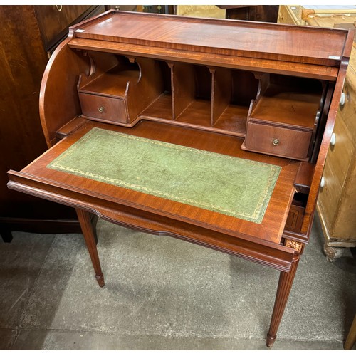 177A - A Victorian style mahogany cylinder top desk