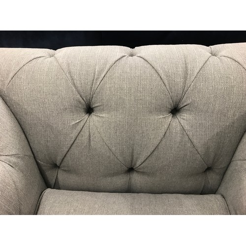 1400 - A grey upholstered Chesterfield love seat RRP £1299