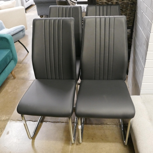 1416 - A set of four black & chrome dining chairs *This lot is subject to VAT