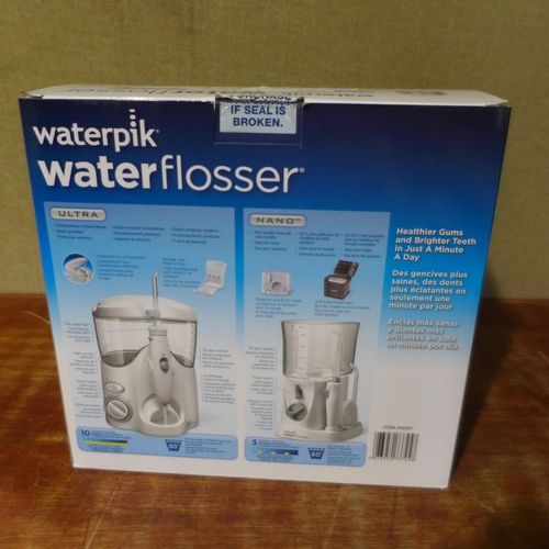 3011 - Waterpik Water Flosser   - This lot requires a UK adaptor      (327-261 )  * This lot is subject to ... 