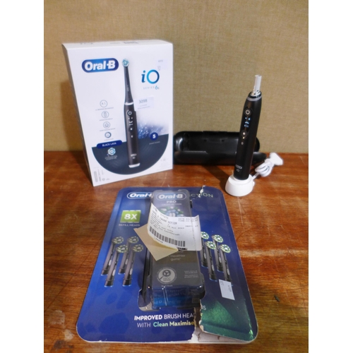 3098 - Oral-B Io6S Toothbrush and Oral B Cross Action Heads - This lot requires a UK adaptor    (327-210,23... 