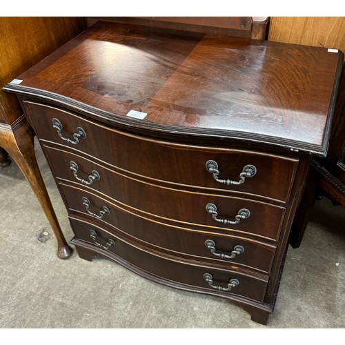 194 - A George III style mahogany serpentine chest of drawers