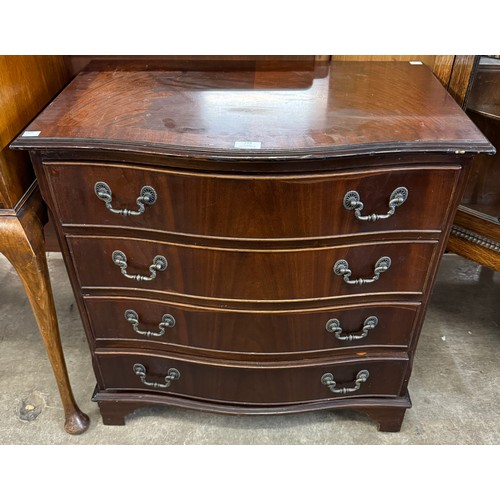 194 - A George III style mahogany serpentine chest of drawers