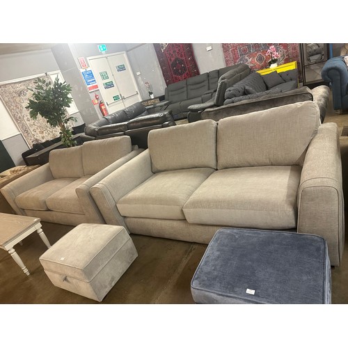 1357 - A pair of grey fabric three seater sofas