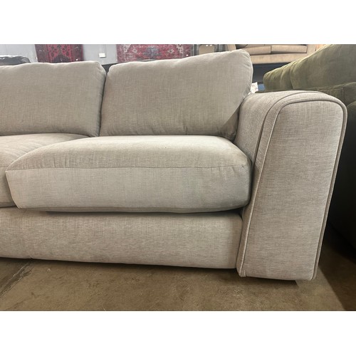 1357 - A pair of grey fabric three seater sofas