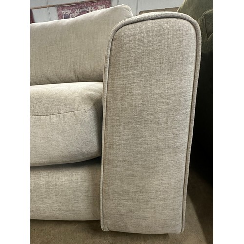 1357 - A pair of grey fabric three seater sofas