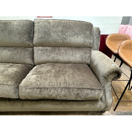 1389 - A brown velvet Oakham Parker Knoll three seater sofa