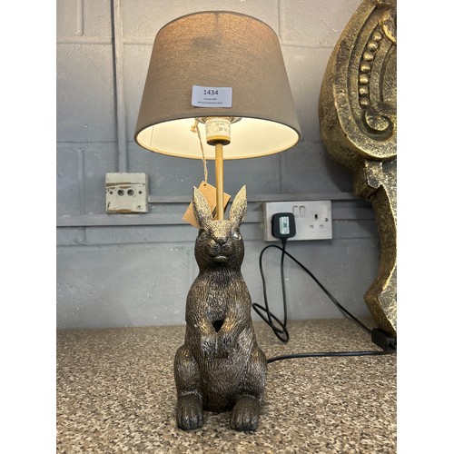 1434 - A Rabbit figure table lamp with Taupe woven shade