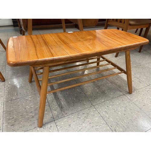 73 - An Ercol Blonde elm and beech coffee table