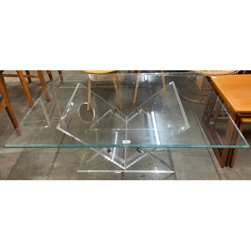 88 - A clear Perspex and glass topped coffee table