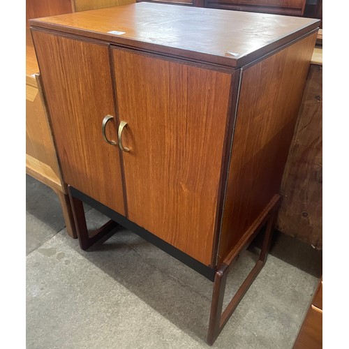 93 - A teak two door record cabinet