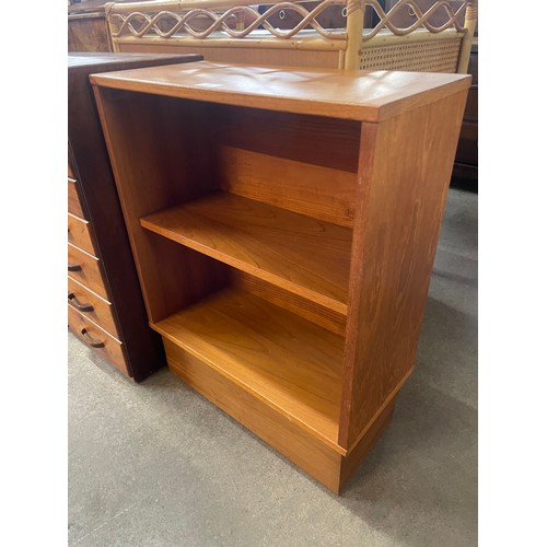 95 - A small teak open bookcase