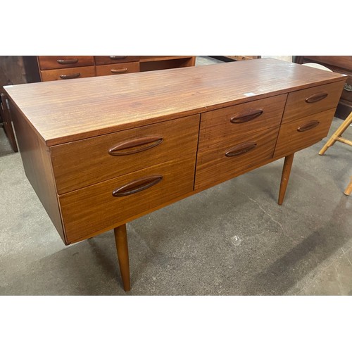 100 - A teak sideboard