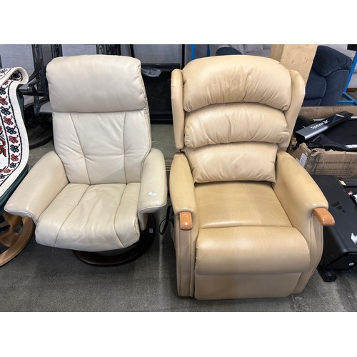 1491 - Two cream leather reclining armchairs