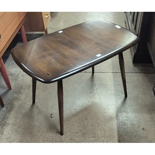 137 - An Ercol dark elm Windsor coffee table