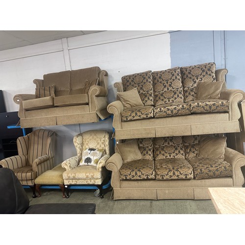 1527 - A pair of Berkeley three seater sofas, a Berkeley two seater sofa, two wingback armchairs and two fo... 