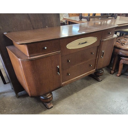 130 - An oak sideboard